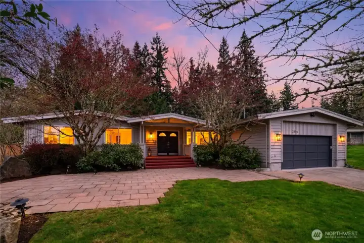 Beautiful curb appeal with inviting entry and mature landscaping