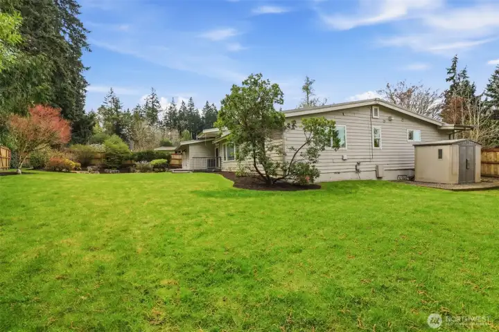 Rear exterior showcasing yard space and privacy