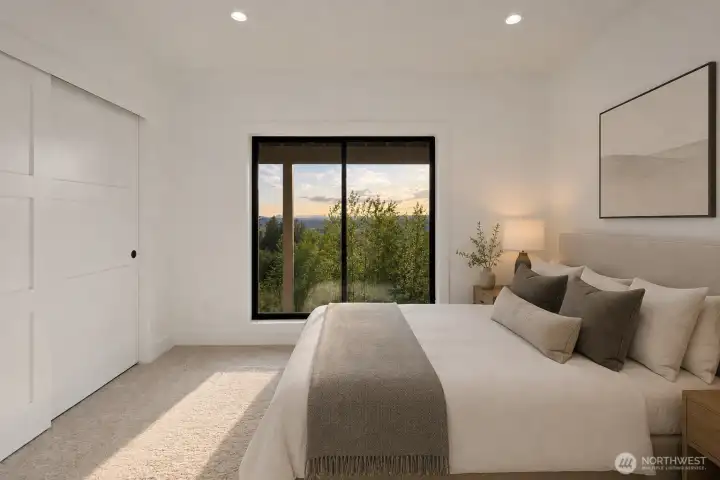 Guest bedroom #3, still has views... Photo is virtually staged.