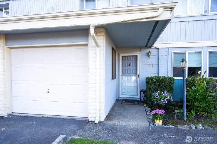Welcome home to this ground floor one level condo in Villa Del Rio with attached garage.