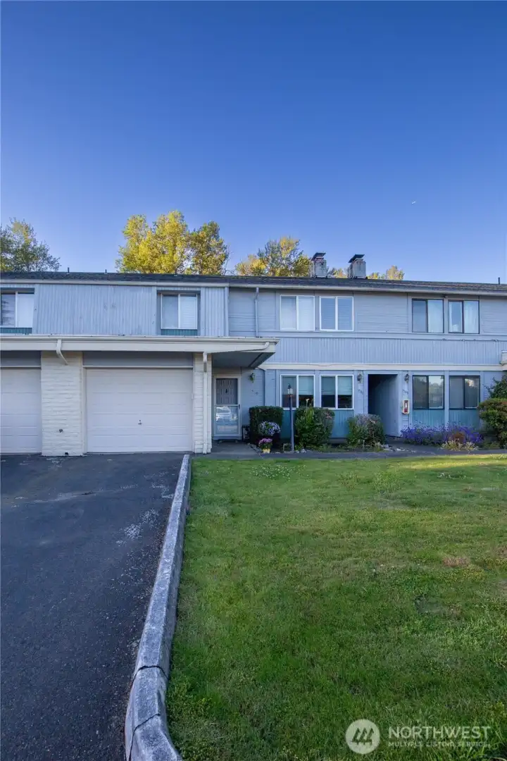 This condo has the attached 1 car garage with in-home door access from the laundry room. The HOA dues covers all the yard, grounds and all exterior maintenance for these condos.