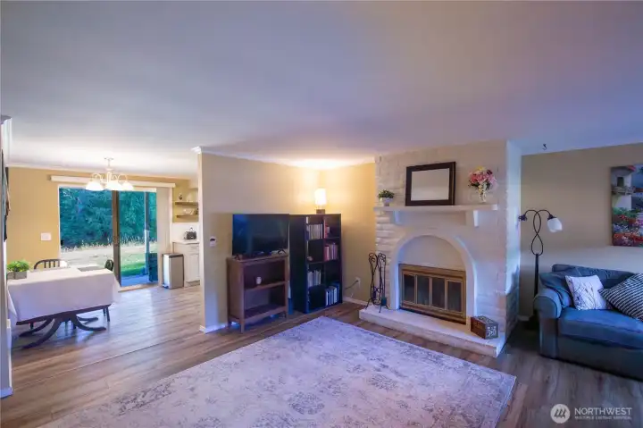 As you enter this condo, you'll see the open living space which flows from living room to dining area and kitchen and the beautiful easy care LVP flooring throughout most of the condo.