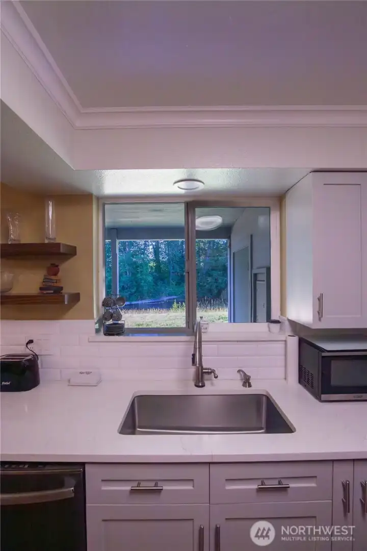 Imagine looking out at the river views while doing dishes and meal preparations.