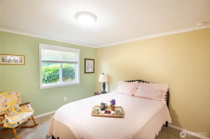 The 2nd bedroom offers so many options for more sleeping space, work from home office, or whatever your needs, with it's own view out to the river as well.