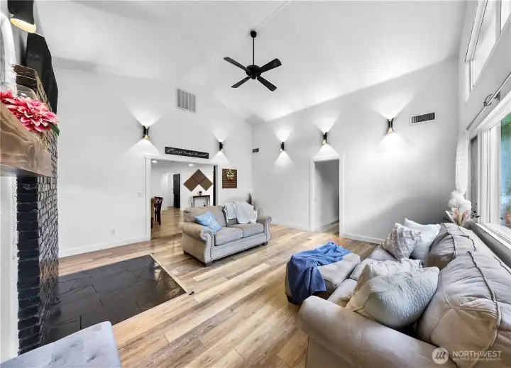 Bright and open living space with new custom lighting features Bright and open living space with new custom lighting features