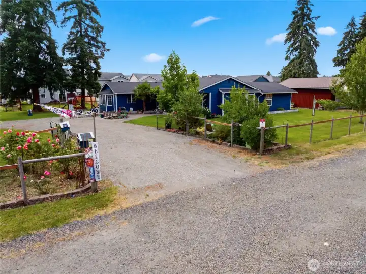 Lovingly cared for single story home with a gated entry.
