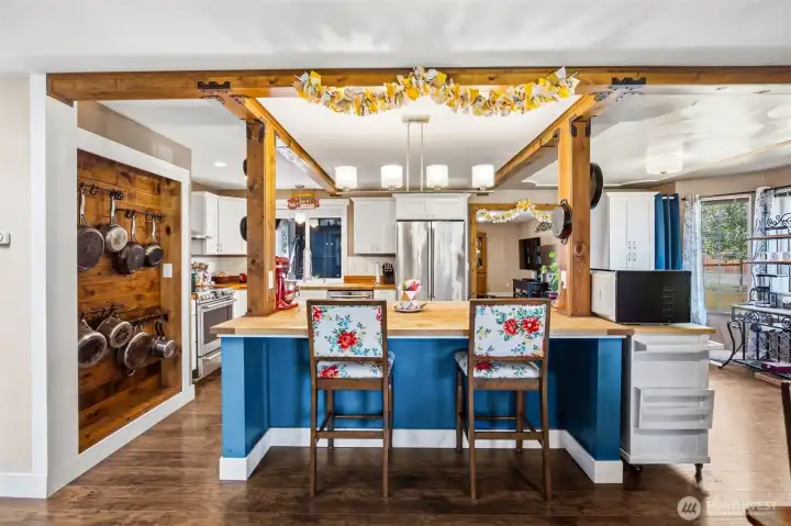 Enter in to the stunning chef's farm kitchen with this unique recessed pots & pans wall.