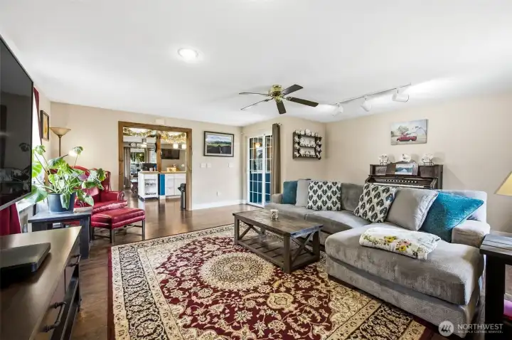 Wood wrapped walkway into the living room. SO much charm everywhere you turn!