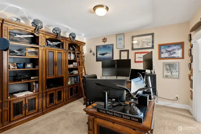 Large home office measuring 12.75x13.25 with a sliding glass door to the right of picture leading to a private, covered deck.