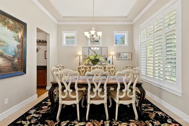 Bright, large dining room with lots of windows and natural light.