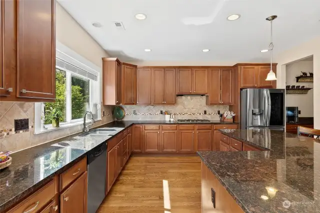 Light and bright with beautiful hardwood floors and granite counters.