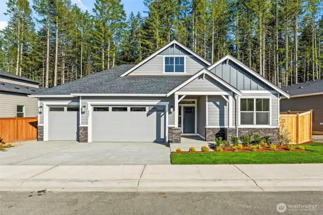 Gorgeous rambler with 3-car garage on greenbelt
