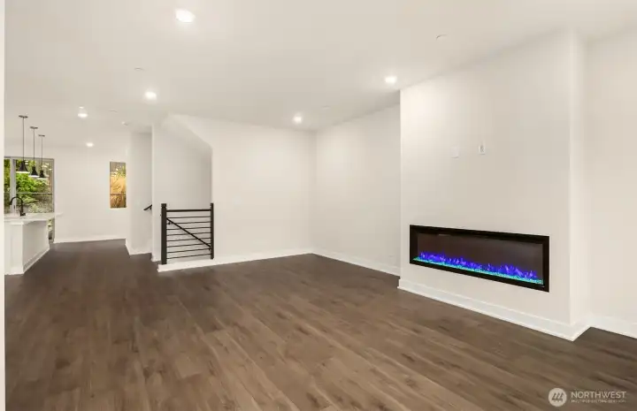 Gathering room includes large electric fireplace