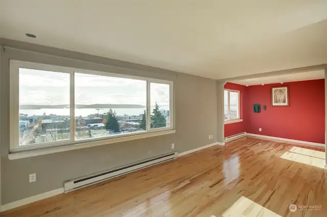 Living and dining room showing the width of view.  This is old paint scheme.  All freshly painted.