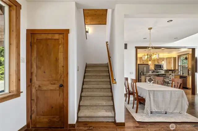One of the entry closets and access to upstairs.