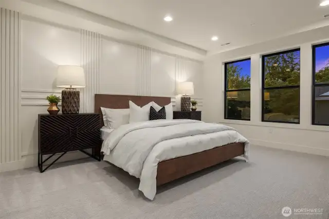 Designer primary suite with five-piece bath with heated floors