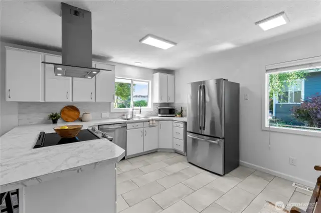 CLASSIC KITCHEN | The updated stainless steel appliances compliment the original cabinets for the perfect balance of modern and character.