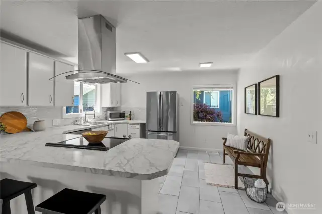 KITCHEN | The eat-in kitchen is pictured here with a bench, but there's ample space for small table or a big buffet/hutch/sideboard.
