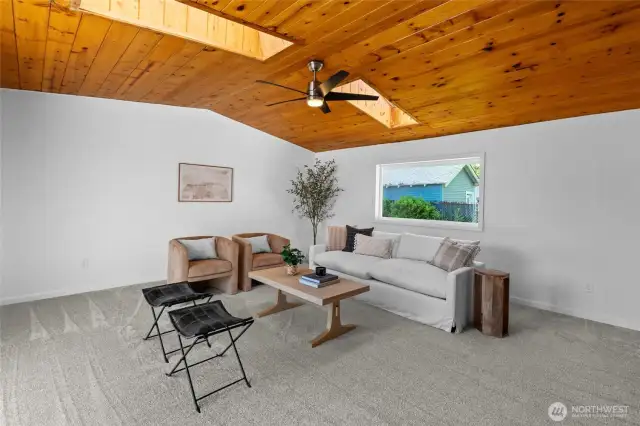 GREAT ROOM | This room is located at the back of the home and connects to the back yard via a sliding glass door that opens onto the generous patio.