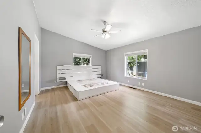 Primary suite with bed frame that stays with the purchase.