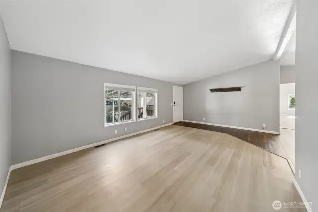Living room with newer flooring.