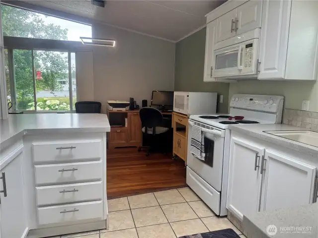 The kitchen counters and cupboards.