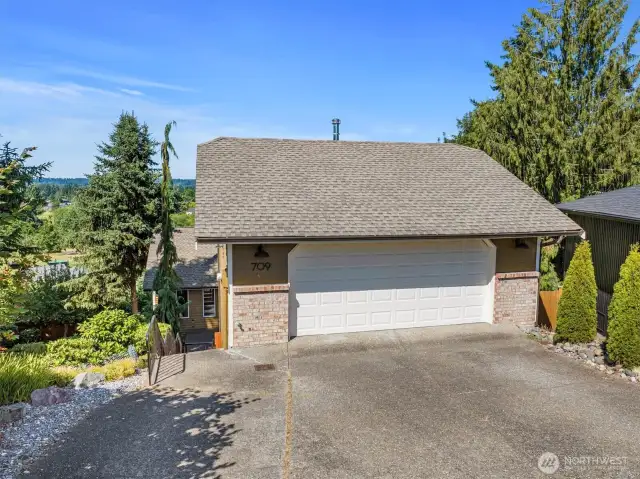 Spacious 2-car garage to accommodate cars and storage needs.
