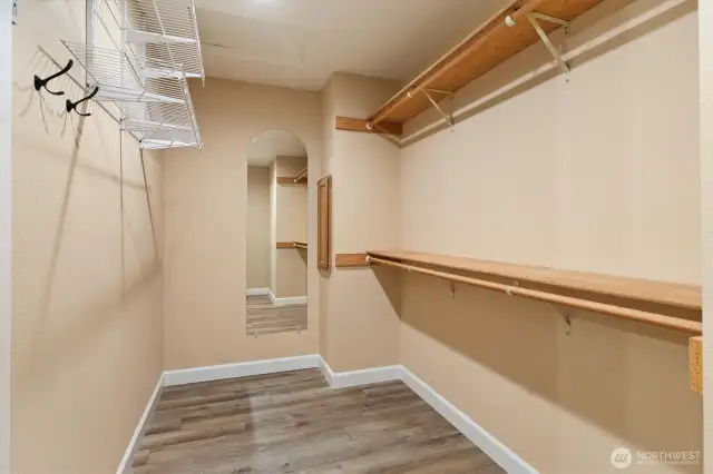 Generous closet space enhanced by convenient shelving. Laundry chute to the laundry room for convenience.