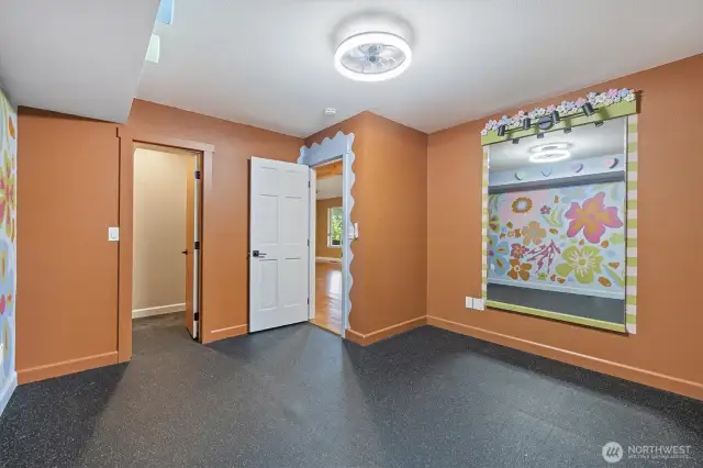 Endless possibilities in this versatile bedroom—perfect for a gym, office, or playroom.