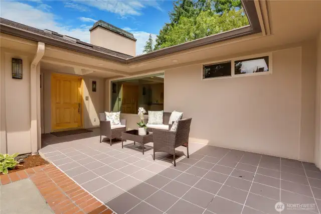 Courtyard area by the main entrance is a tranquil spot to enjoy the water feature & landscape.