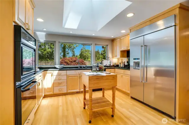 Second view of the kitchen with counter depth refrigerator/freezer.