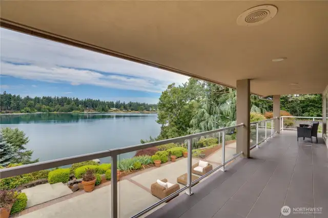 Upper level covered deck accessible from the primary suite & the main level great room.