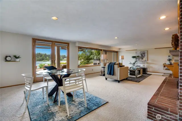 Expansive living room with room for a game table on the lower level with great lake views.