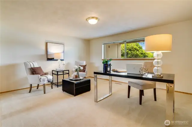 One of the two bedrooms downstairs staged as an office.