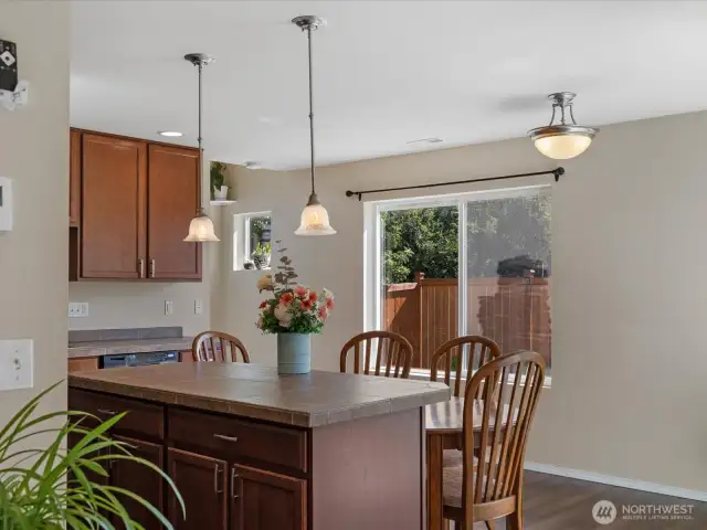 View from edge of living room into kitchen & dining spaces