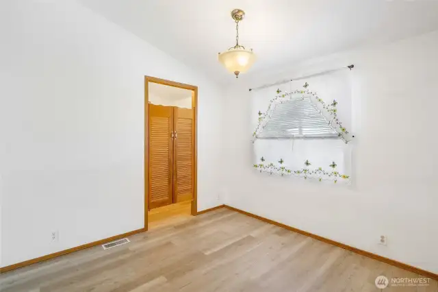 As you stand in the dining space, you'll notice the doors to the utility/laundry room which also goes out to the back door. There's a washer and dryer in there waiting for you!