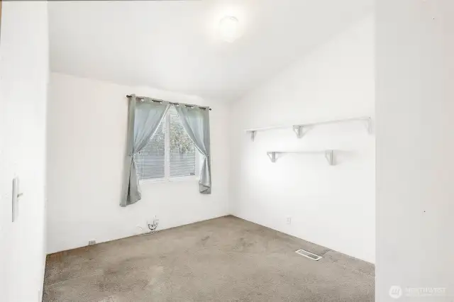 Another view of the cozy third bedroom.