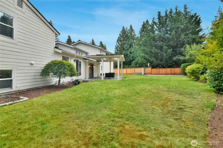 Backyard bliss—spacious grounds with room for sports and gatherings.
