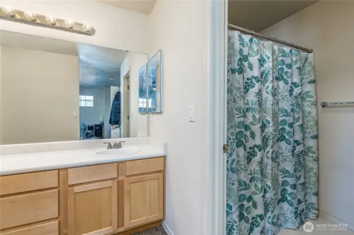 Primary bathroom with separated shower/toilet room