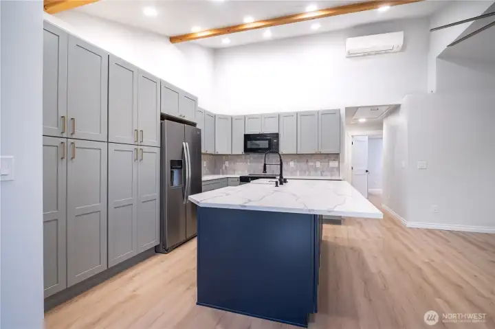 Lots of cabinet space, designer backsplash