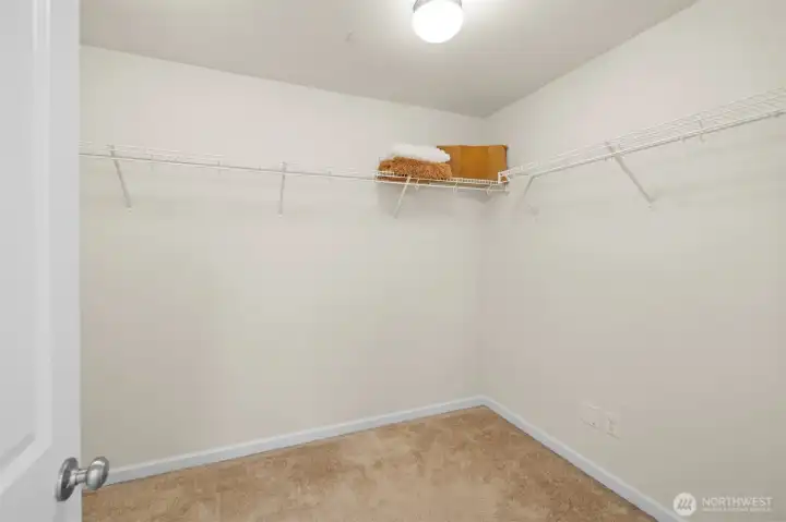 Primary suite walk-in closet! It has tons of room or it's a great canvas for custom closets.