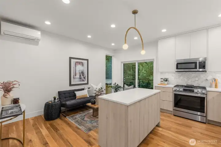 Chef-inspired kitchen seamlessly flows into the dining space for effortless hosting.