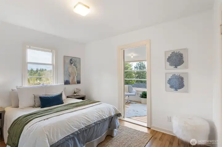 2nd bedroom with wood floors