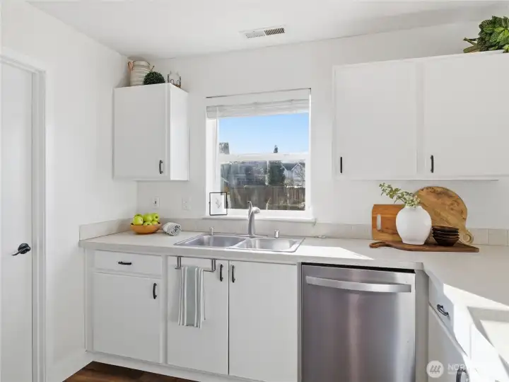 kitchen sink w/ window to the backyard