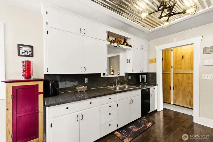 Kitchen showing double sink and dishwasher
