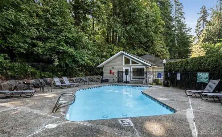 Cabana features large gathering room with full kitchen, dining, board room, fitness room & bathroom. The outdoor pool is located just outside cabana.