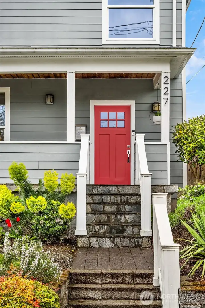 Part of a fully-permitted 2016 remodel, is custom paver and stone work and grand front porch.