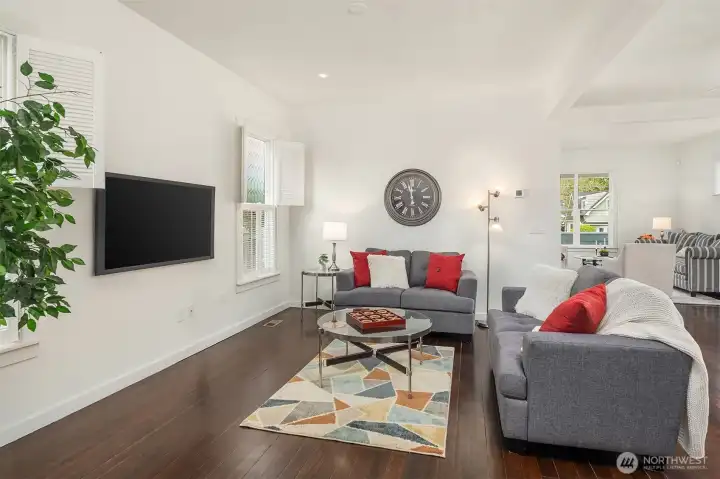 A good sized media/flex space is off of the kitchen to provide a multitude of uses. Craftsman details with plantation shutters throughout.