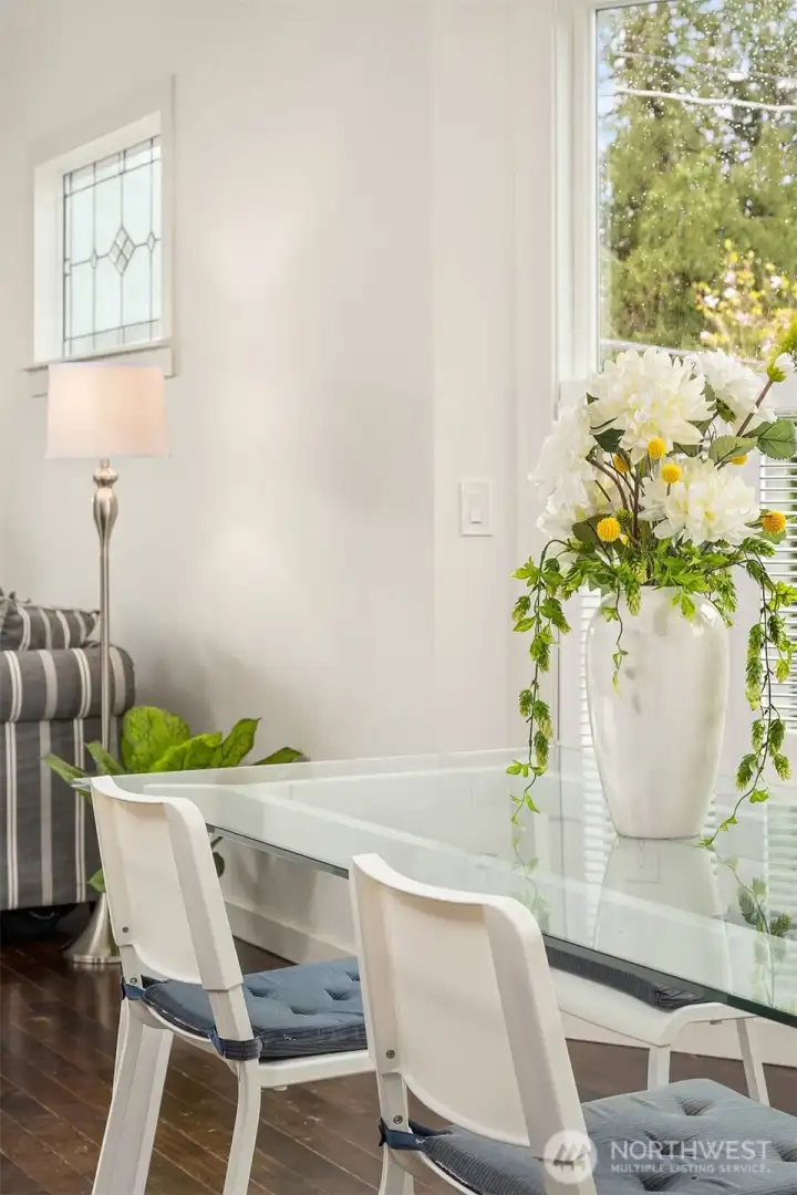 A large bay window adjacent to the dining area invites in plenty of natural light.