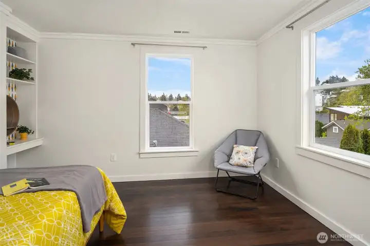 One of two additional bedrooms on the second floor.
